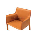 Orange saddle leather Cab dining chairs